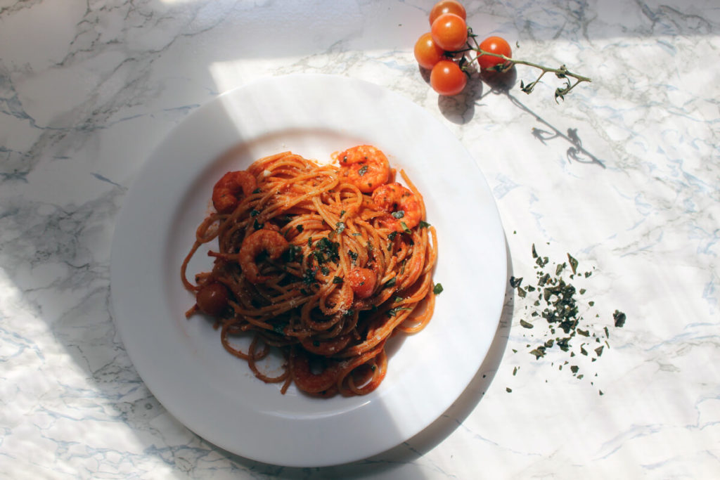 Tomato pasta with shrimp and basil