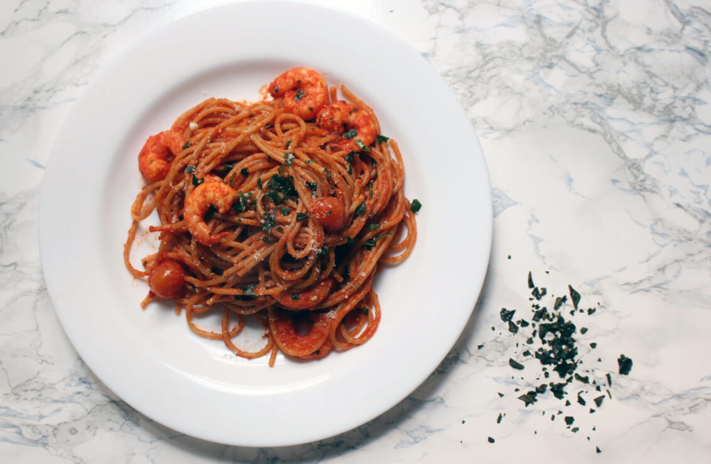Tomato pasta with shrimp and basil