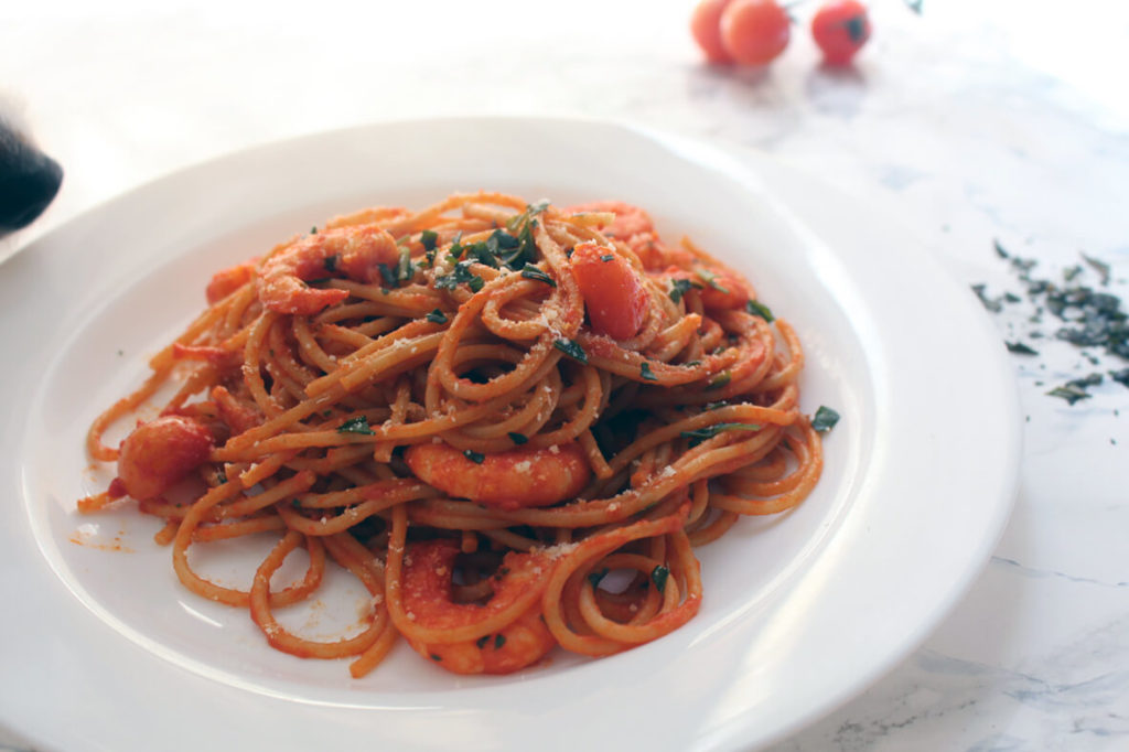 Tomato pasta with shrimp and basil